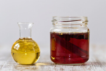 A bottle with tea, lemon and honey