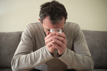 caucasian man addicted to alcohol