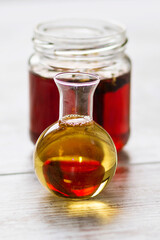 A bottle with tea, lemon and honey