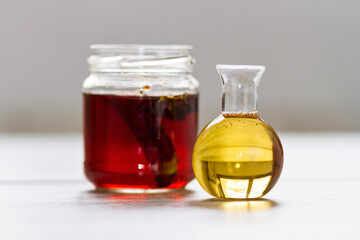 A bottle with tea, lemon and honey