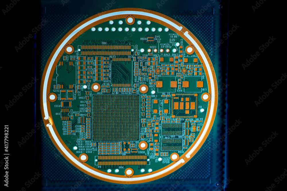 Poster round printed circuit board. printed circuit board with luminous elements. round pcb. pcb on a dark 