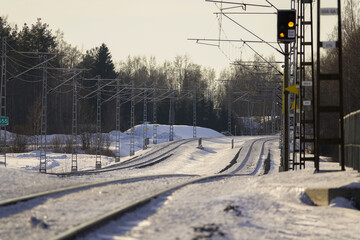 sloping electrical railroad in winter