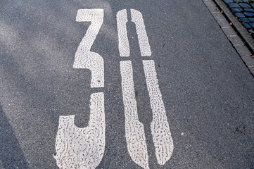 bicycle lane sign on asphalt