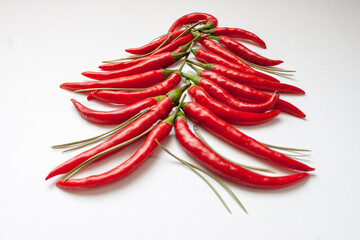 Closeup top view red chili pepper with sliced on white background, raw food ingredient concept