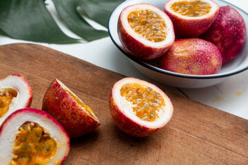 Passion fruit on wooden white background