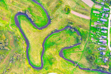 Aerial view of the rural landscape from above - rivers, fields, forests, roads. Territory sounding surveying, topoography mapping.