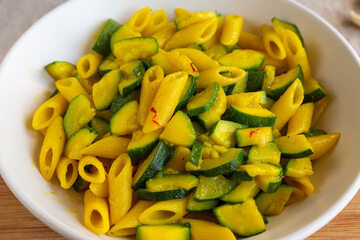 Pasta with zucchini and saffron. Ideal for a fast lunch. Vegetarian dish.