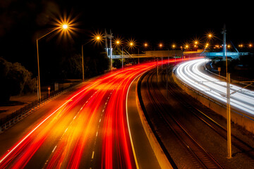Naklejka na ściany i meble Light trails on a motorway at night, Perth, Western Australia, Australia