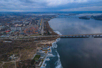 Dark clouds over the city in spring with drone