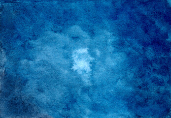 Abstract watercolor texture background. Creative aquarelle wallpaper. Romantic dark blue and indigo wallpaper. Original artwork. Hand drawn illustration. Color splashing on paper. Cosmic texture