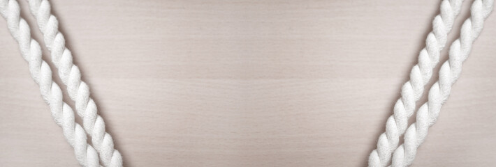 braided rope on wood background