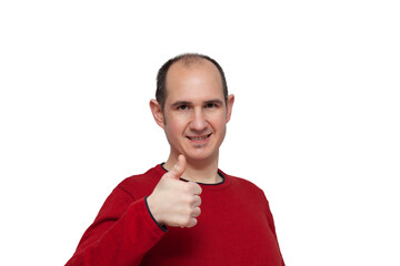 A boy raising his thumb