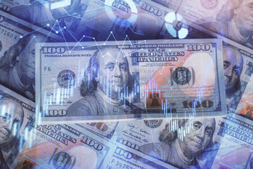 Multi exposure of forex chart drawing over us dollars bill background. Concept of financial success markets.