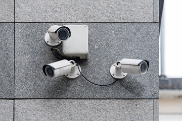 Security cameras on modern building. Professional surveillance camera. CCTV on the wall with LED IR...