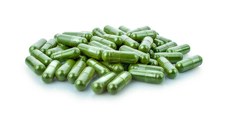 Moringa capsule pills on white background