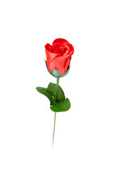 Artificial red rose, isolated on a white background.