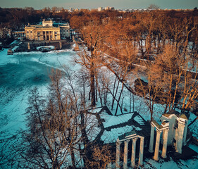 Beautiful panoramic aerial drone view of the Palace on the Isle (Polish: Palac Na Wyspie), also known as Baths Palace (Polish: Palac Lazienkowski), is a classicist palace in Warsaw's Royal Baths Park