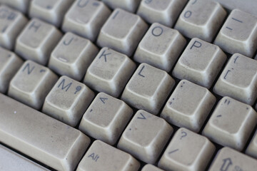 Close up of old white keyboard