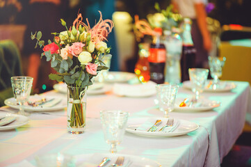 Luxurious floral arrangement of pink and white flowers fixed on the wall