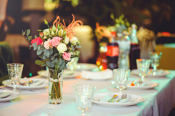 Luxurious floral arrangement of pink and white flowers fixed on the wall