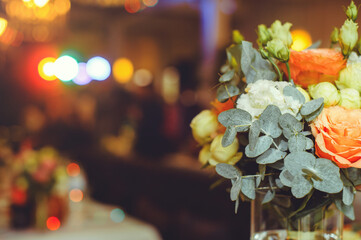 Luxurious floral arrangement of pink and white flowers fixed on the wall