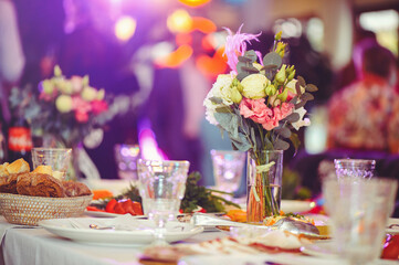 Luxurious floral arrangement of pink and white flowers fixed on the wall