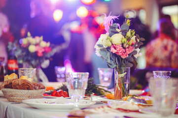 Luxurious floral arrangement of pink and white flowers fixed on the wall