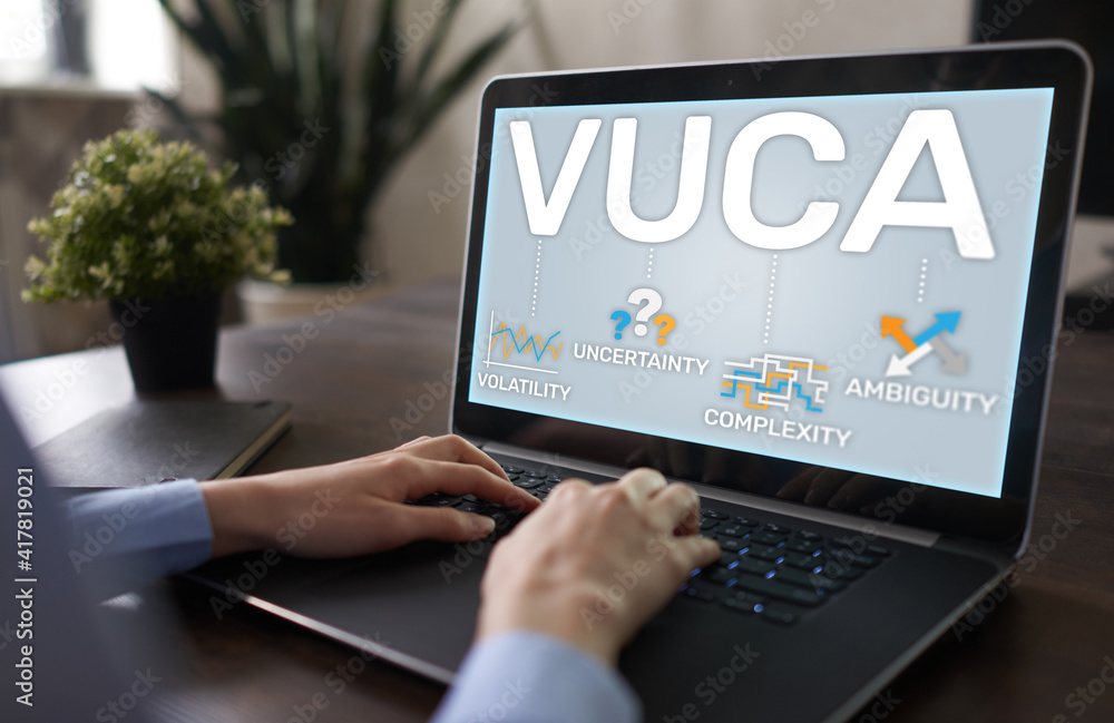 Poster vuca world concept on screen. volatility, uncertainty, complexity, ambiguity.