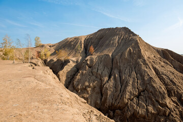Konduki, Tula region, Romancevskie mountains, Abandoned Ushakov quarries. The mud erosion of the soil looks like mountains. The area is overgrown with young birches. Beautiful natural landscape