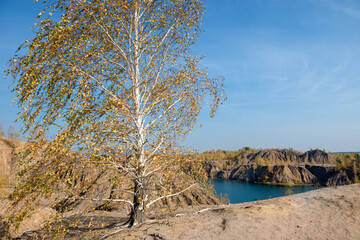 Konduki, Tula region, Romancevskie mountains, Abandoned Ushakov quarries. The mud erosion of the soil looks like mountains. The area is overgrown with young birches. Beautiful natural landscape