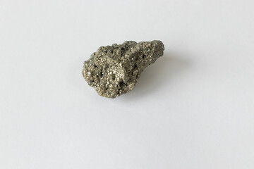 Pyrite stone isolated on a white background