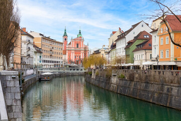 Fototapeta na wymiar Ljubljana city centre at autumn in Slovenia with river Ljubljanica.