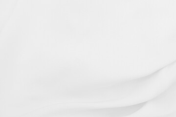 Beautiful white fabric waves, soft focus, used for backgrounds. White cloth background