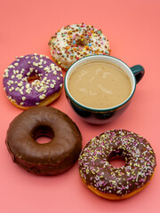 assorted donuts and cup of coffee