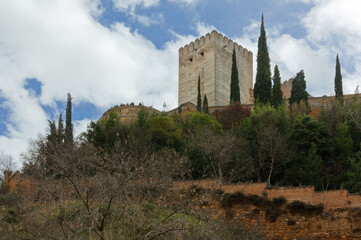 Fototapeta na wymiar Tower of the medieval complex of Alhambra in Granada, Spain