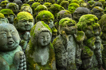 Buddhist stone statues at the Otagi Nenbutsu ji temple in Kyoto, Japan