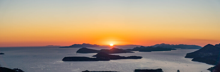 Panoramic view of Adriatic Islands with Dubrovnik old town in sunset hour from top of Mountain Srd