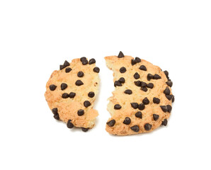 broken in half round biscuit biscuit with chocolate pieces isolated on white background
