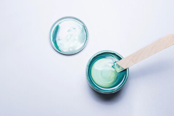 jar with paint emerald, green, sea water color beautiful trend color