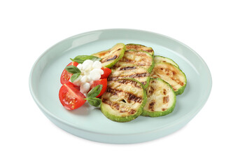 Delicious grilled zucchini slices served with cottage cheese and tomatoes on white background