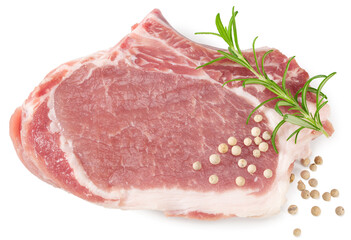 sliced raw pork meat with rosemar and peppercorn isolated on white background. Clipping path and full depth of field