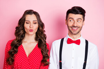 Portrait of nice optimistic brown hair couple blow kiss look she wear dress he shirt isolated on pastel pink color background