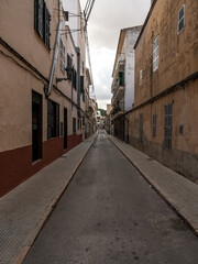 Fototapeta na wymiar narrow street in a village in majorca