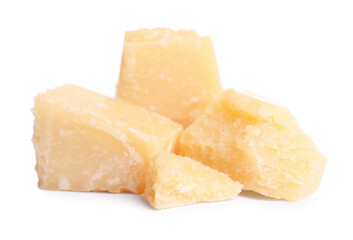 Pieces of delicious parmesan cheese on white background
