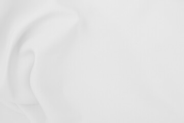 Fototapeta premium Beautiful white fabric waves, soft focus, used for backgrounds. White cloth background
