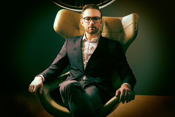 rich man in armchair