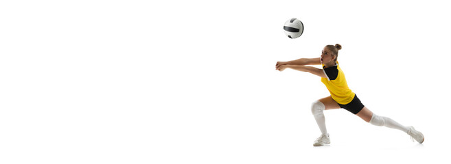 Flyer. Young female volleyball player isolated on white studio background. Woman in sportswear...