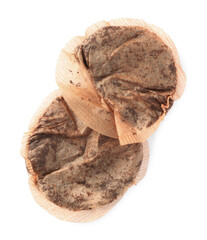 Used tea bags on white background, top view