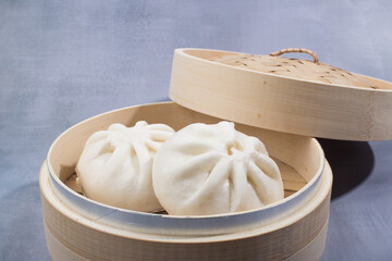 Asian food steamed bun with red bean paste filling.