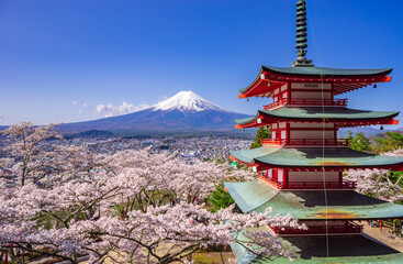 Chureito red pagoda with sakura in foreground and mount Fuji in background, Fujiyoshida, Japan - 417837620
